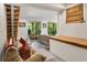 Inviting living room with concrete floors, sliding doors to the backyard, and neutral decor at 132 Lakeshore Dr, Roswell, GA 30075