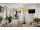 Bright living room featuring a sliding glass door, concrete floors, and neutral paint at 132 Lakeshore Dr, Roswell, GA 30075