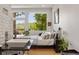 Serene main bedroom with dual sinks, a large window with scenic views, and modern decor at 132 Lakeshore Dr, Roswell, GA 30075