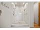 Modern shower with white tile, dual shower heads, and pebble flooring at 132 Lakeshore Dr, Roswell, GA 30075