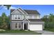 Charming two-story home with brick and gray siding, complemented by a well-manicured lawn at 271 Abbotts Crossing Cir, Conyers, GA 30094