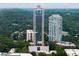 Stunning aerial view of high-rise condos surrounded by lush trees at 2828 Peachtree Nw Rd # P 3300, Atlanta, GA 30305