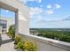 Long balcony with potted plants and a view of the city skyline at 2828 Peachtree Nw Rd # P 3300, Atlanta, GA 30305
