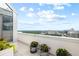 This balcony features a city view with beautiful planters and a unique enclosed sunroom at 2828 Peachtree Nw Rd # P 3300, Atlanta, GA 30305