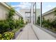 Long balcony with a variety of potted plants creating a garden feel at 2828 Peachtree Nw Rd # P 3300, Atlanta, GA 30305