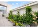 Long balcony with potted plants lining the rail, offering a lush garden view at 2828 Peachtree Nw Rd # P 3300, Atlanta, GA 30305