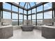Bright bathroom featuring modern sinks, a stylish tub and window views overlooking the city at 2828 Peachtree Nw Rd # P 3300, Atlanta, GA 30305
