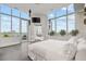 Light bedroom with large windows and city views. Opens to a large balcony at 2828 Peachtree Nw Rd # P 3300, Atlanta, GA 30305