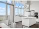 Bright, modern kitchen with an island, stainless appliances and large windows at 2828 Peachtree Nw Rd # P 3300, Atlanta, GA 30305