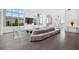 Bright living room features floor to ceiling windows, grey tile floors, and modern furnishings at 2828 Peachtree Nw Rd # P 3300, Atlanta, GA 30305