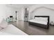 Bright main bedroom featuring a king-sized bed, sitting area, and modern finishes at 2828 Peachtree Nw Rd # P 3300, Atlanta, GA 30305
