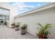Bright and open patio lined with beautiful planters and tile flooring at 2828 Peachtree Nw Rd # P 3300, Atlanta, GA 30305