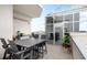 Spacious patio with an outdoor kitchen, dining area and city views at 2828 Peachtree Nw Rd # P 3300, Atlanta, GA 30305