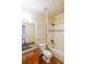 Bathroom with tile floors, wood vanity, and shower/tub combo at 1403 Benbrooke Circle Northwest Nw Cir, Acworth, GA 30101