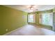 Light green bedroom features carpet flooring, ceiling fan, and natural light at 1403 Benbrooke Circle Northwest Nw Cir, Acworth, GA 30101