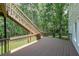 Large wooden deck overlooking a beautiful, landscaped backyard at 1403 Benbrooke Circle Northwest Nw Cir, Acworth, GA 30101