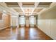 Elegant dining room with hardwood floors and a coffered ceiling, perfect for entertaining guests at 1403 Benbrooke Circle Northwest Nw Cir, Acworth, GA 30101