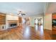 Inviting living room with hardwood floors, a cozy fireplace, and built-in bookshelves at 1403 Benbrooke Circle Northwest Nw Cir, Acworth, GA 30101