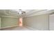 Spacious bedroom features a decorative ceiling, fan, carpeting, and shuttered windows at 1403 Benbrooke Circle Northwest Nw Cir, Acworth, GA 30101
