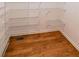 Walk-in closet with wire shelving and hardwood floors at 1403 Benbrooke Circle Northwest Nw Cir, Acworth, GA 30101