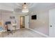 Basement office with a desk and a woven light fixture at 3072 Parks Run, Loganville, GA 30052