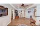 Spacious basement has neutral paint, wood-look floors, recessed lights, and a wall-mounted TV at 3072 Parks Run, Loganville, GA 30052