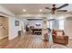 Open basement features neutral walls, wood floors, recessed lights, and a game area with a pool table at 3072 Parks Run, Loganville, GA 30052