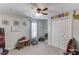 Bedroom featuring natural light, dinosaur décor, and ample space for play at 3072 Parks Run, Loganville, GA 30052