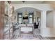 Elegant foyer leading to a spacious living room with a fireplace at 3072 Parks Run, Loganville, GA 30052