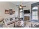 Comfortable living room featuring a fireplace and plenty of natural light at 3072 Parks Run, Loganville, GA 30052