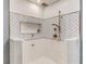 Modern shower featuring a rainfall showerhead, handheld sprayer, and decorative herringbone tile at 3072 Parks Run, Loganville, GA 30052