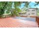 The backyard features a deck and in-ground pool at 4262 Hambrick Way, Stone Mountain, GA 30083