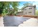 Large covered pool with brick patio and view of the backyard and home's exterior at 4262 Hambrick Way, Stone Mountain, GA 30083