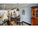 Cozy dining area with decorative lighting and a view of the kitchen at 4265 Pleasant Woods Dr, Cumming, GA 30028