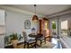 Cozy dining area with decorative lighting and a view of the backyard patio at 4265 Pleasant Woods Dr, Cumming, GA 30028
