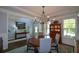 Cozy dining room with wood floors and natural light, perfect for Gathering meals at 4265 Pleasant Woods Dr, Cumming, GA 30028