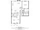 Detailed first floor plan showcasing open-concept kitchen, living spaces, and primary bedroom suite at 4265 Pleasant Woods Dr, Cumming, GA 30028