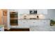 Kitchen boasting stainless steel appliances and sleek granite countertops at 4265 Pleasant Woods Dr, Cumming, GA 30028