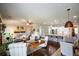 Open concept living room featuring a ceiling fan and hardwood floors at 4265 Pleasant Woods Dr, Cumming, GA 30028