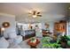 Open-concept living room with eat-in kitchen and hardwood floors at 4265 Pleasant Woods Dr, Cumming, GA 30028