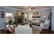 Cozy living room showcases a stone fireplace and natural light at 4265 Pleasant Woods Dr, Cumming, GA 30028