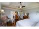 Spacious main bedroom with natural light and views of the bathroom entrance at 4265 Pleasant Woods Dr, Cumming, GA 30028