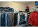 Well-organized walk-in closet featuring shelving, hanging rods, and plenty of storage space at 4265 Pleasant Woods Dr, Cumming, GA 30028