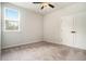 Bedroom featuring a ceiling fan, carpet, and large closet at 122 Riverbirch Way, Dallas, GA 30157