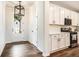 Bright eat-in kitchen featuring stainless steel appliances, quartz countertops, and lots of natural light at 122 Riverbirch Way, Dallas, GA 30157