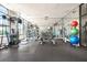 Well-equipped gym with modern exercise machines, weights, and mirrored walls for a complete workout experience at 2277 Peachtree Ne Rd # 405, Atlanta, GA 30309