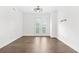 Bright living room with wood floors and natural light from a rear window at 2277 Peachtree Ne Rd # 405, Atlanta, GA 30309