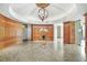 Elegant lobby area featuring a decorative light fixture and decorative wood paneling at 2277 Peachtree Ne Rd # 405, Atlanta, GA 30309