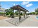 Inviting pergola area with manicured landscaping, providing shade and an inviting place to relax at 2277 Peachtree Ne Rd # 405, Atlanta, GA 30309