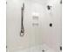 Modern shower design with white tiled walls and dark accents at 2277 Peachtree Ne Rd # 405, Atlanta, GA 30309